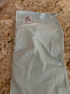 The Ollie Baby Swaddle in Pale Blue